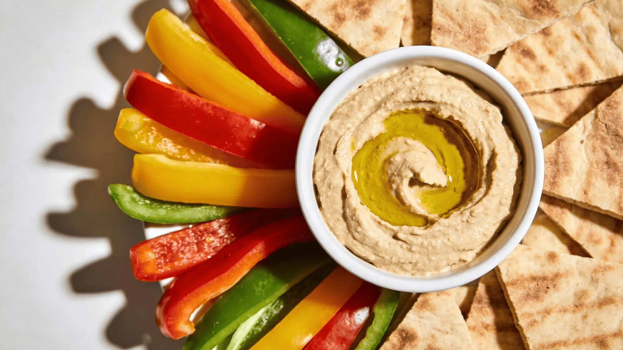 hummus with veggie sticks or whole wheat pita