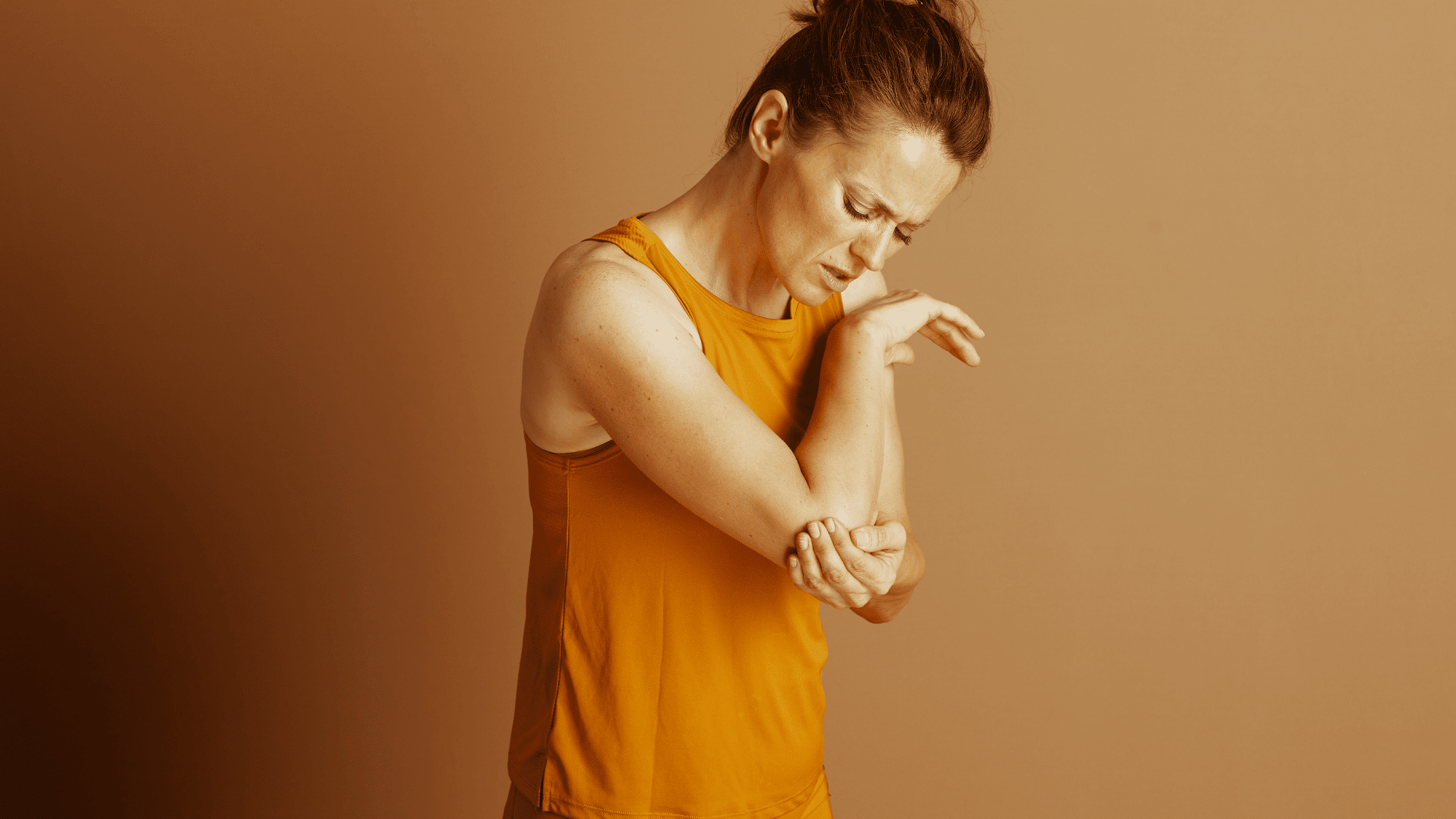 symptoms shared by tennis elbow and golfer s elbow