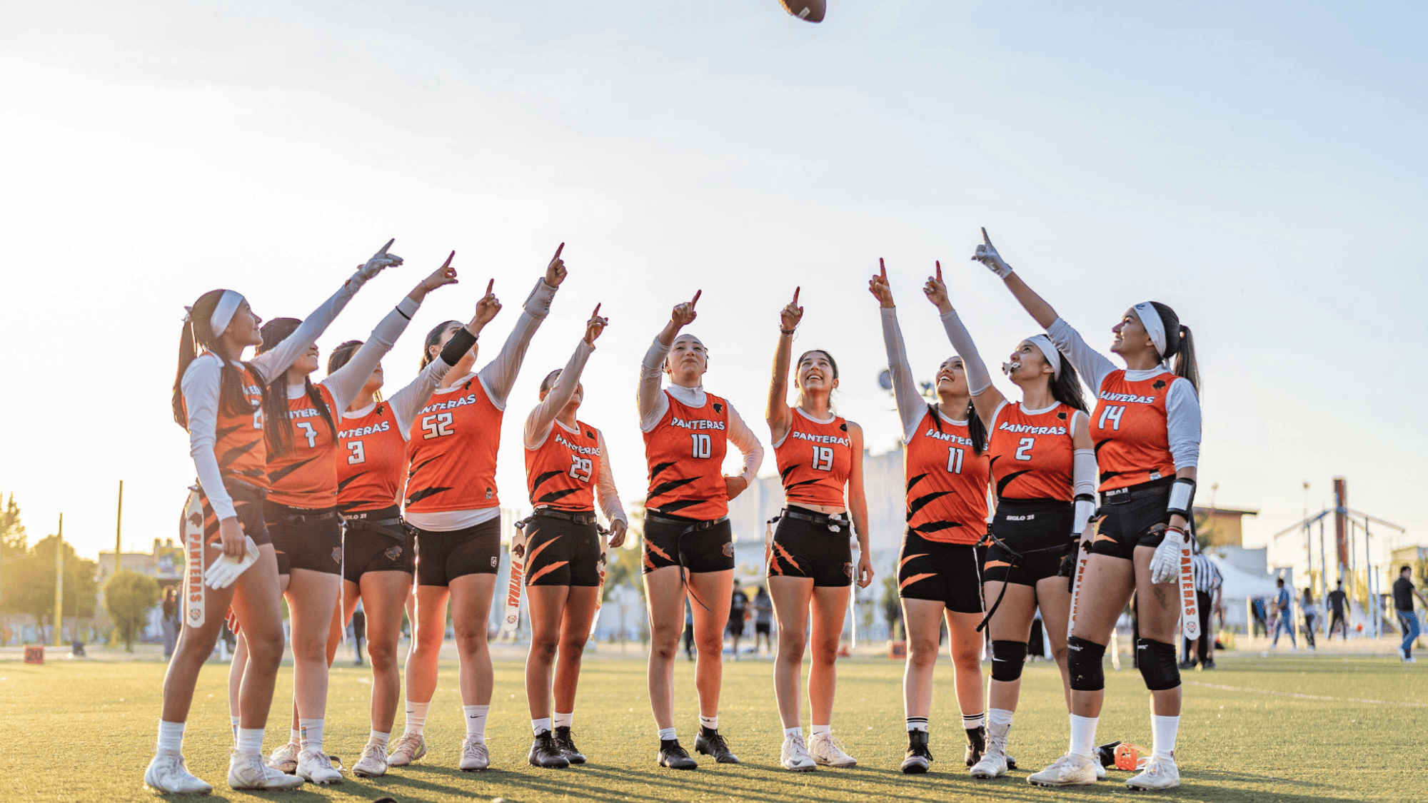 womens football team cheering before start of the match to boost morale