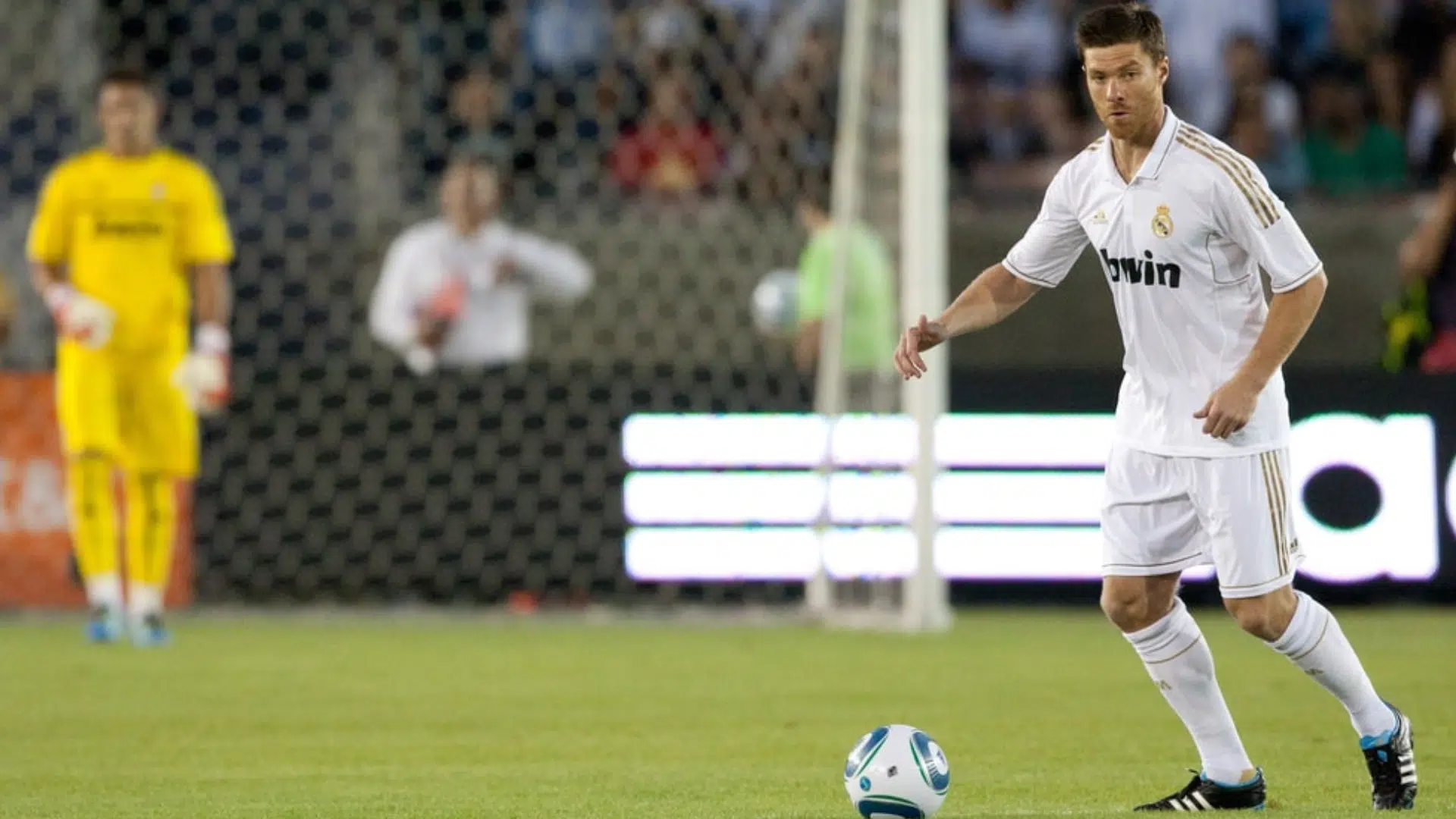 central defensive midfielder controlling ball near defensive half