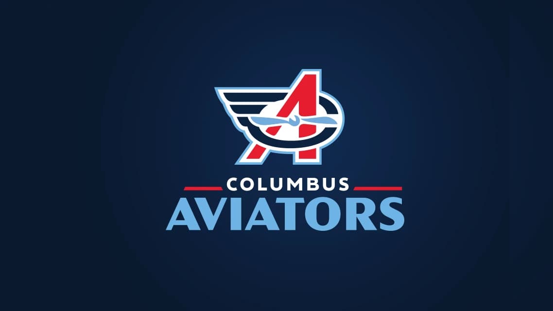 columbus aviators football team logo showing a winged letter a with an airplane on a dark blue background