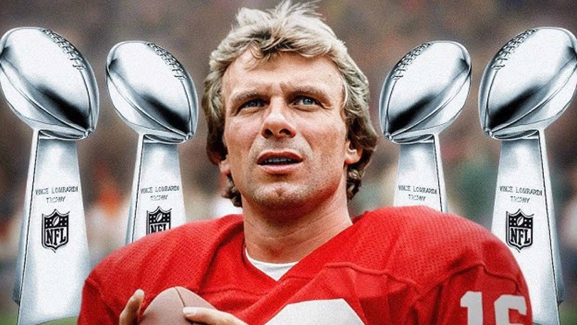 joe montana Is shown with trophy in baground