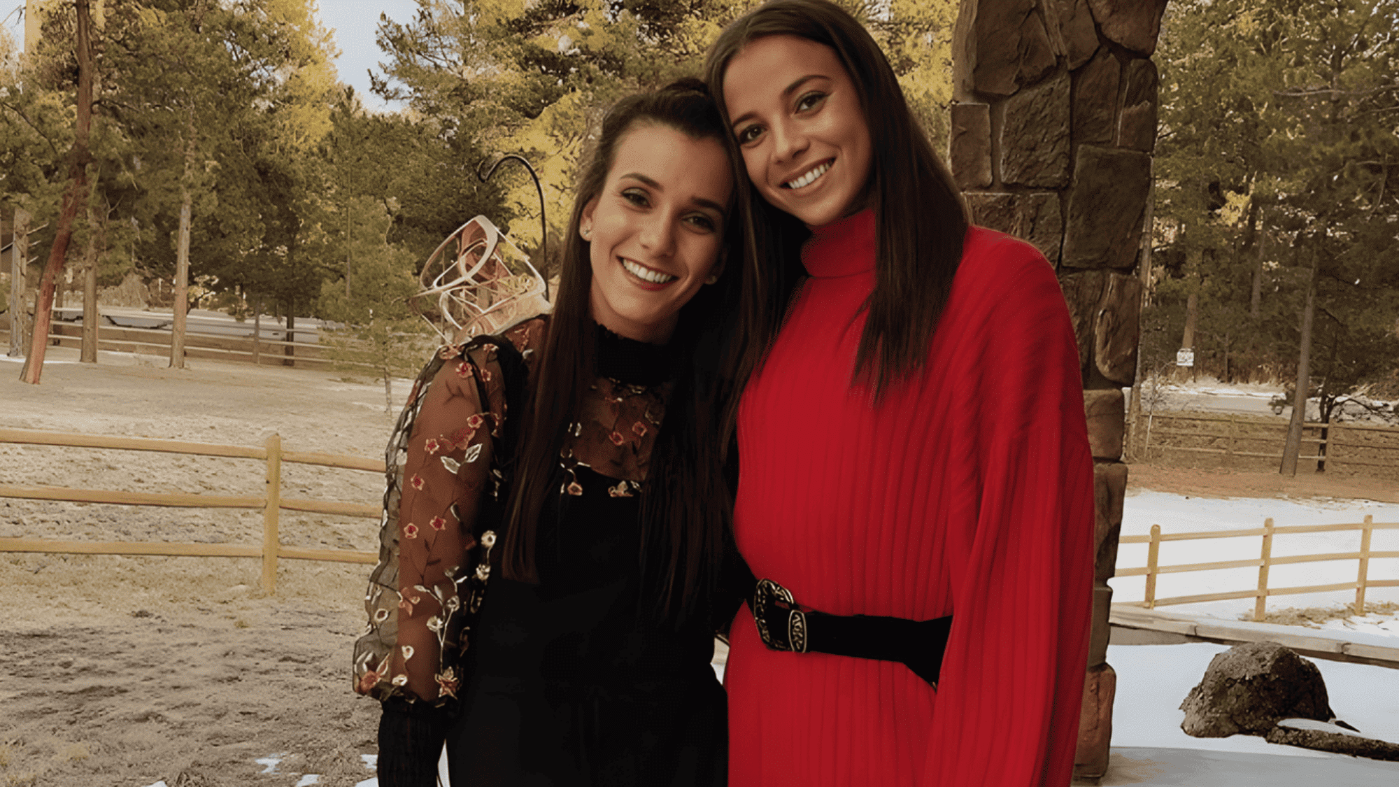 mallory swanson posing with her sister brianna outside their home