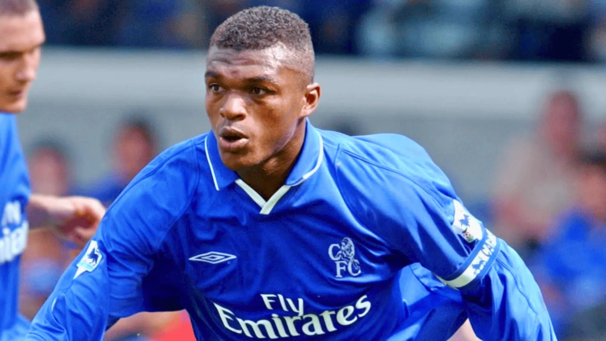 marcel desailly in a blue chelsea jersey focused during a match