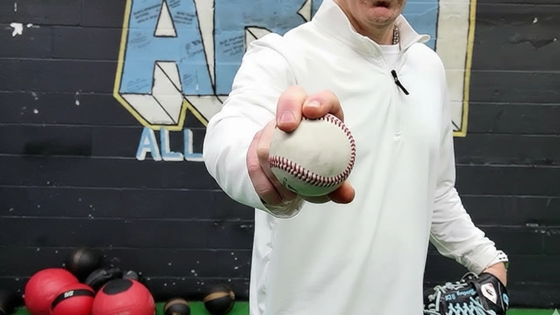 pitcher holding baseball showing proper grip
