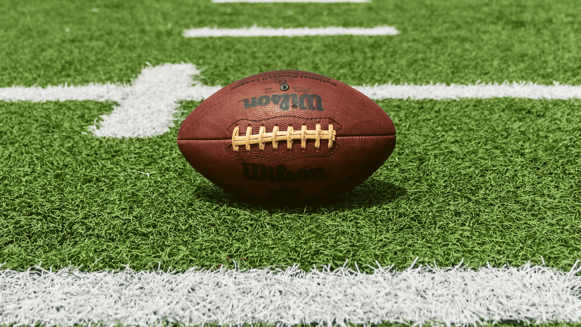 close up of wilson football on field american football facts about american football