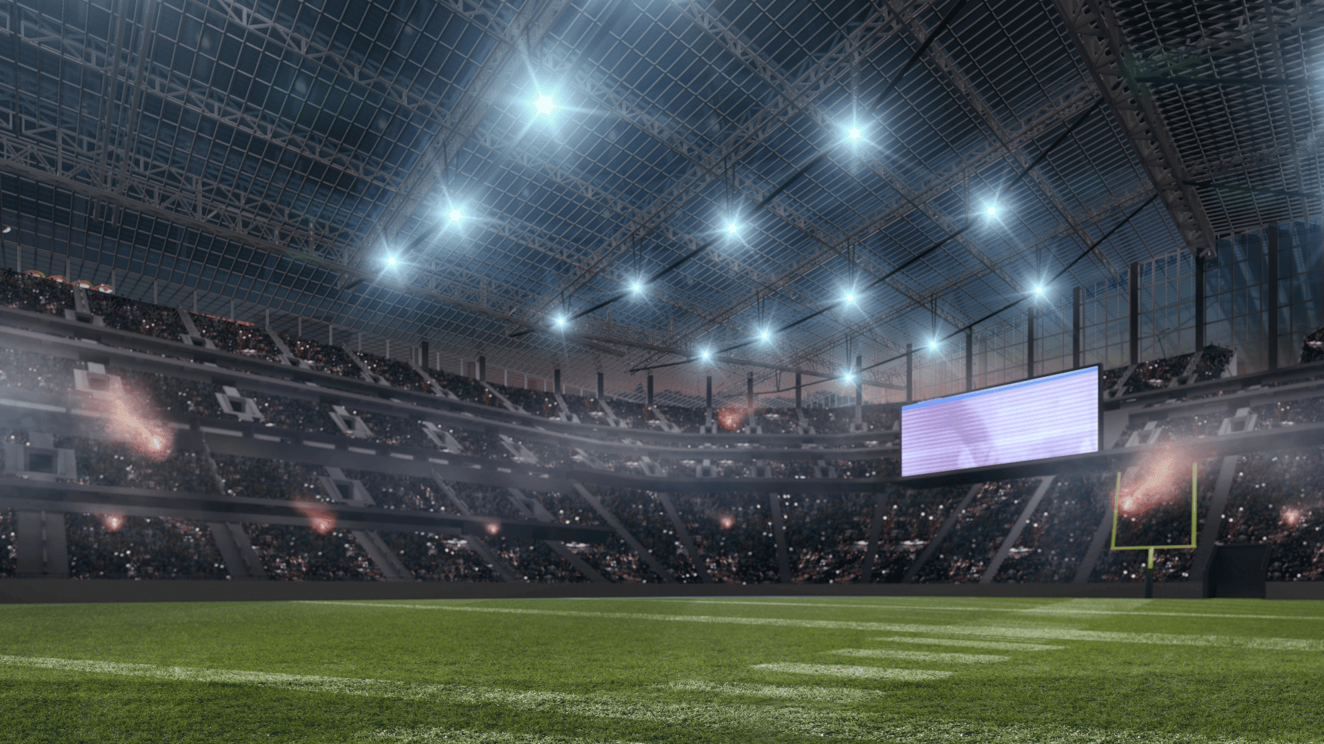indoor football stadium with bright lights crowd and field who pays nil money taxes deals