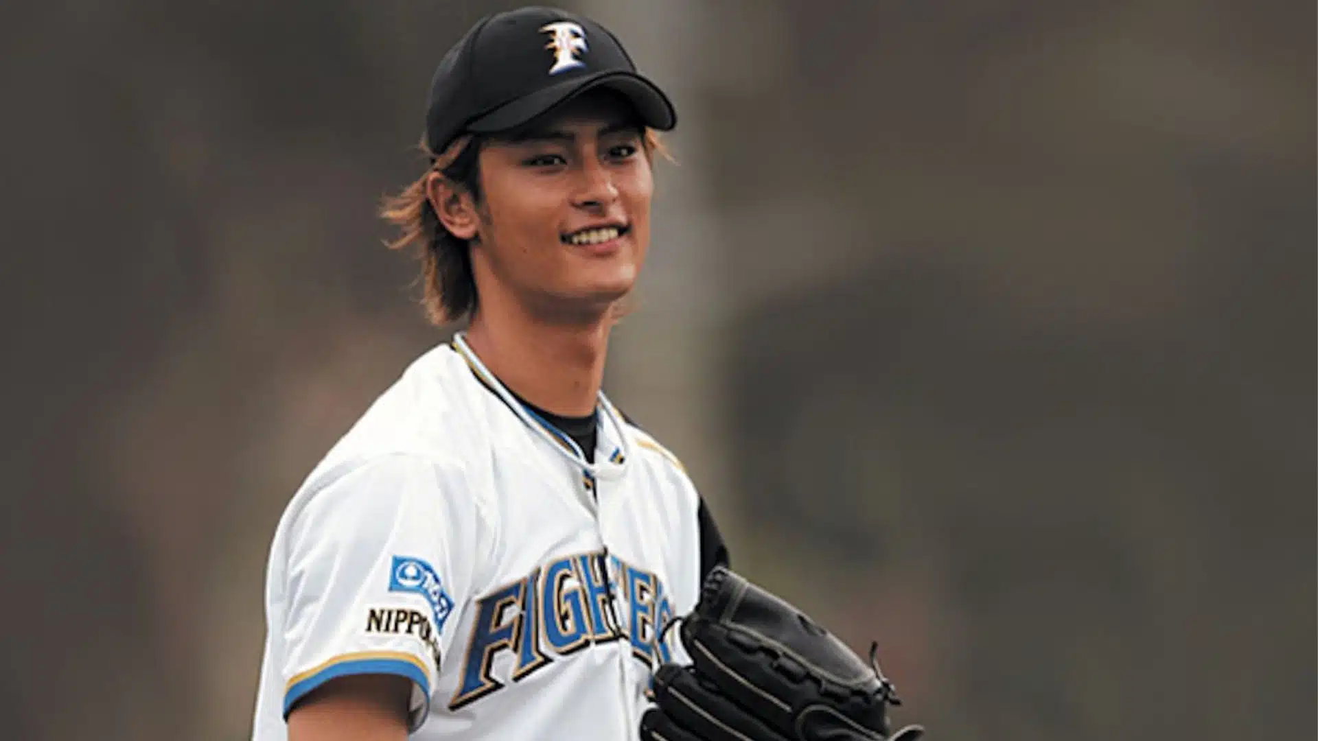 yu darvish among the oldest active mlb players smiling on field wearing white baseball uniform holding gloves