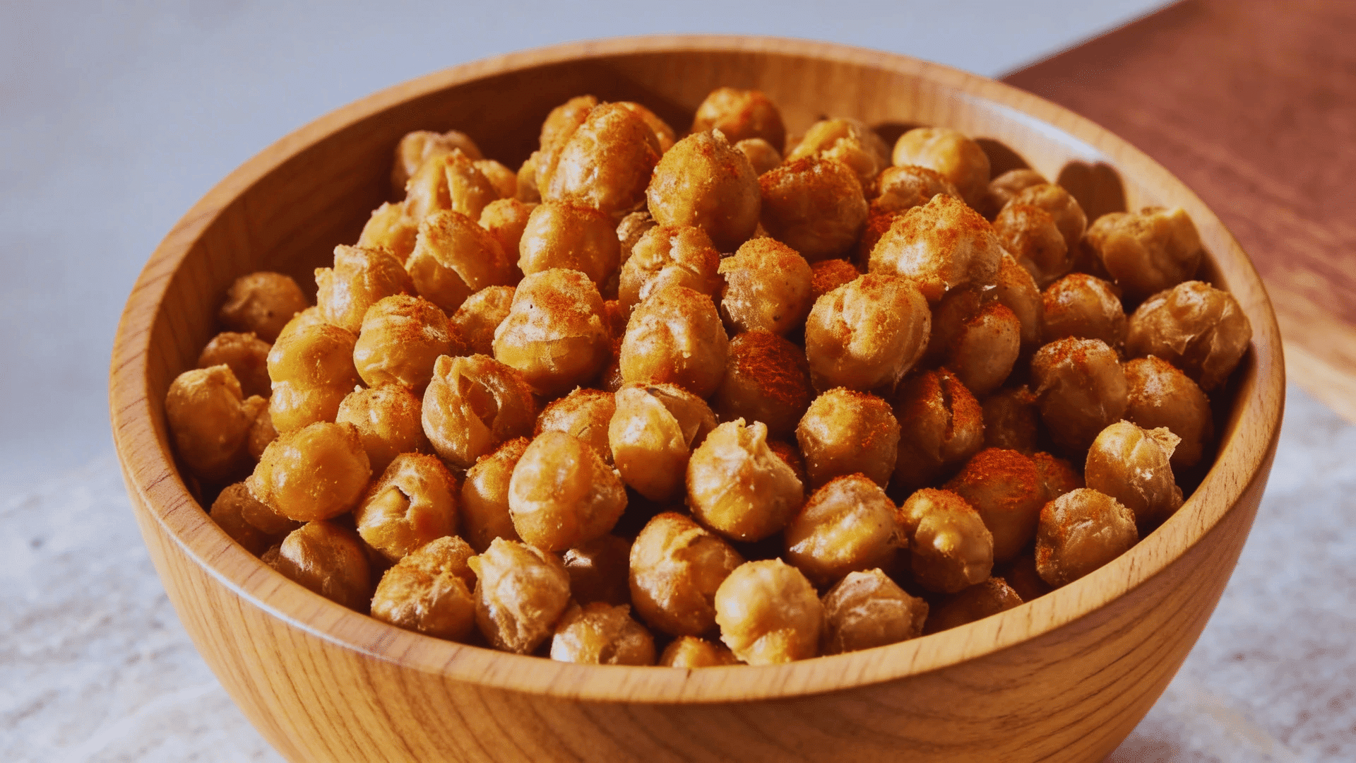 roasted chickpeas with spices in a wooden bowl