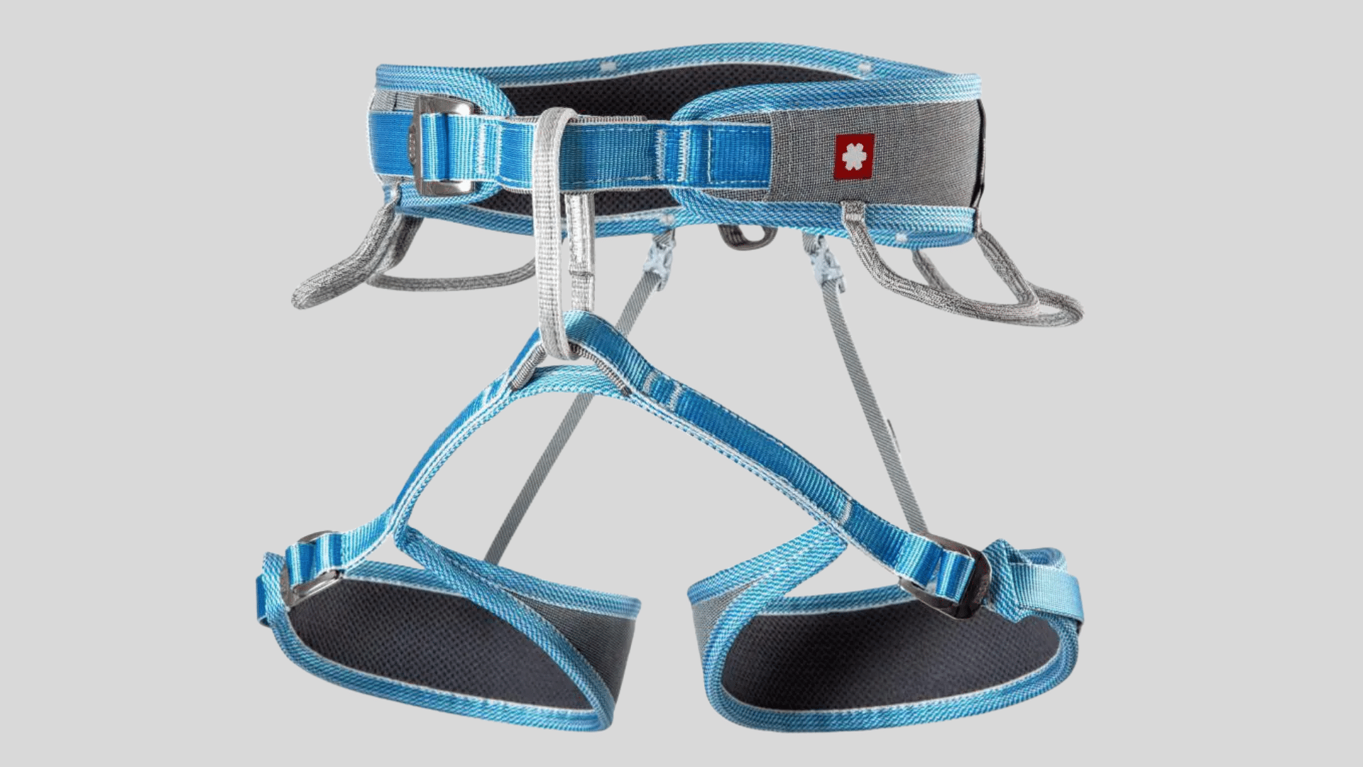 blue and gray climbing harness with adjustable waist belt and leg loops designed for comfort and secure support on a clean background