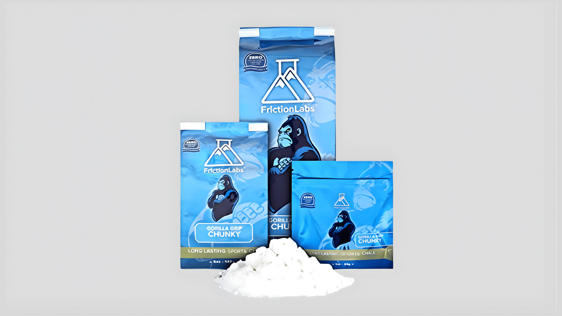 blue chalk bags and loose white climbing chalk powder for grip support on a clean background