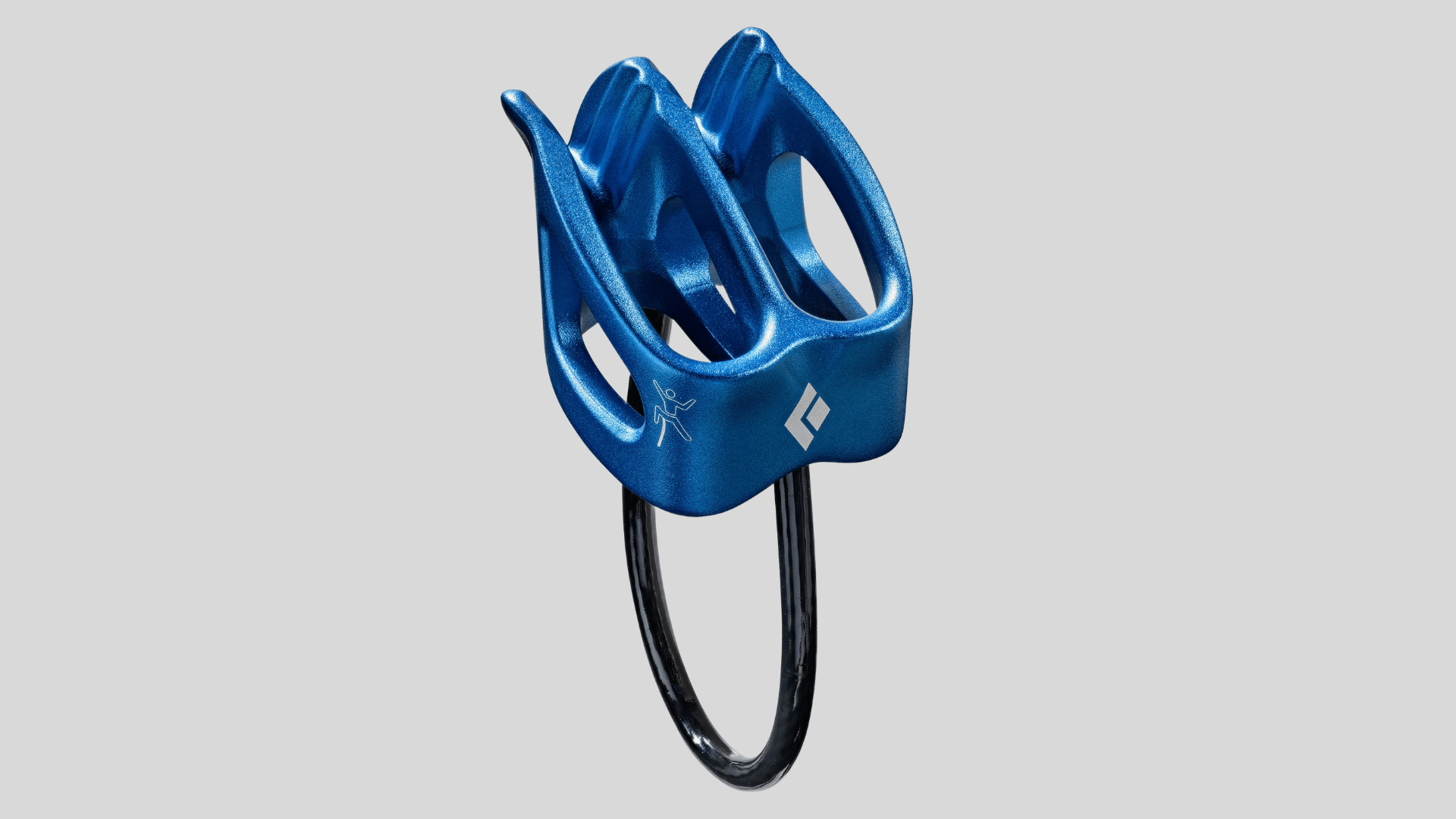 blue climbing belay device with smooth rope channels attached to black carabiner on a plain background
