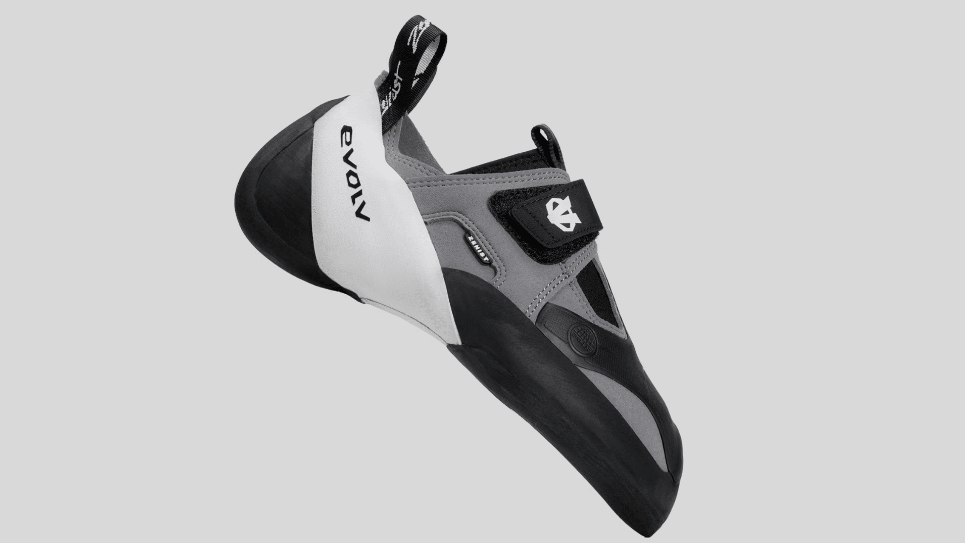 gray and black climbing shoe with strap closure and rubber sole built for grip and precise footwork on a clean background