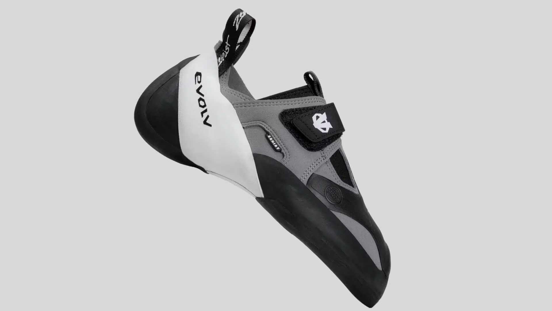 gray and black climbing shoe with strap closure and rubber sole built for grip and precise footwork on a clean background