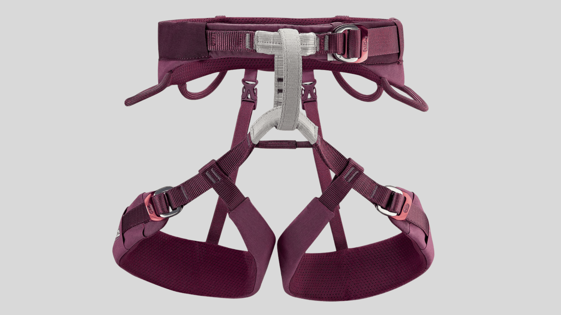 maroon climbing harness with padded waist belt and adjustable leg loops for comfort and secure support on a clean background