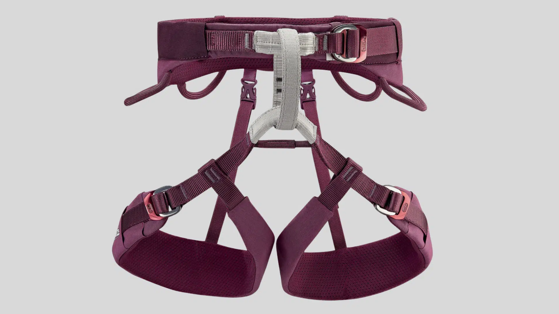 maroon climbing harness with padded waist belt and adjustable leg loops for comfort and secure support on a clean background