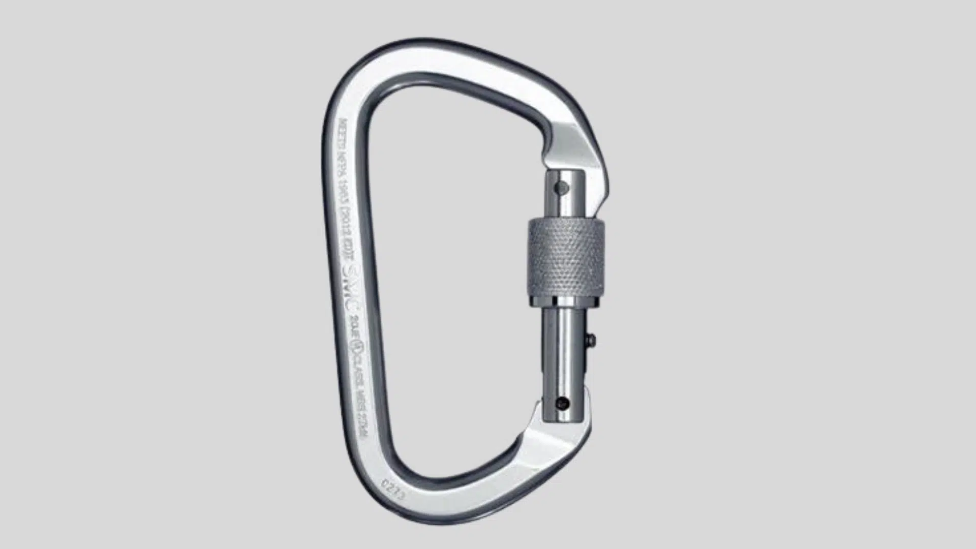 silver locking carabiner with screw gate mechanism used for climbing and safety gear on a plain background