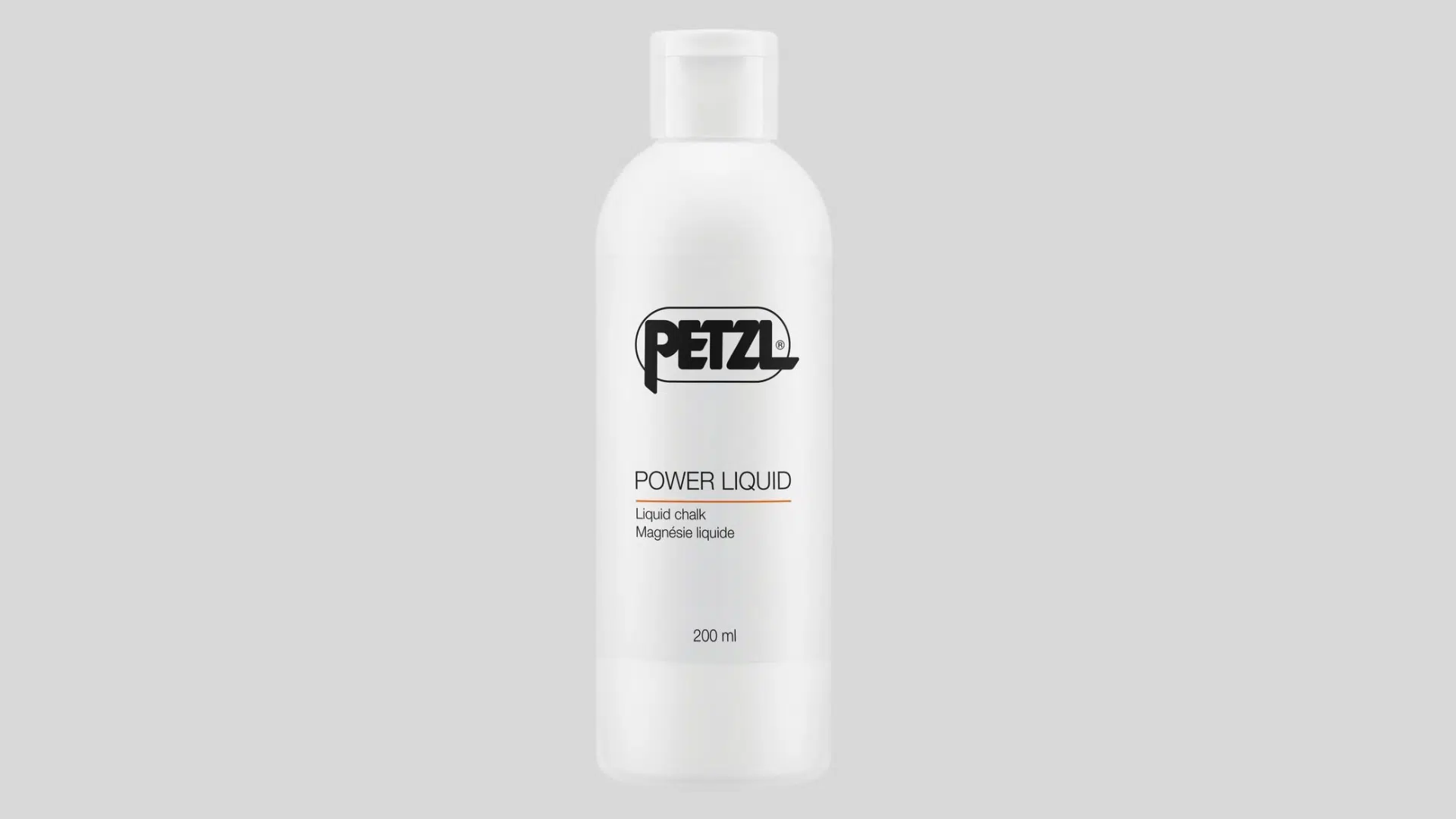 white bottle of liquid chalk for climbing grip with flip cap design on a clean background