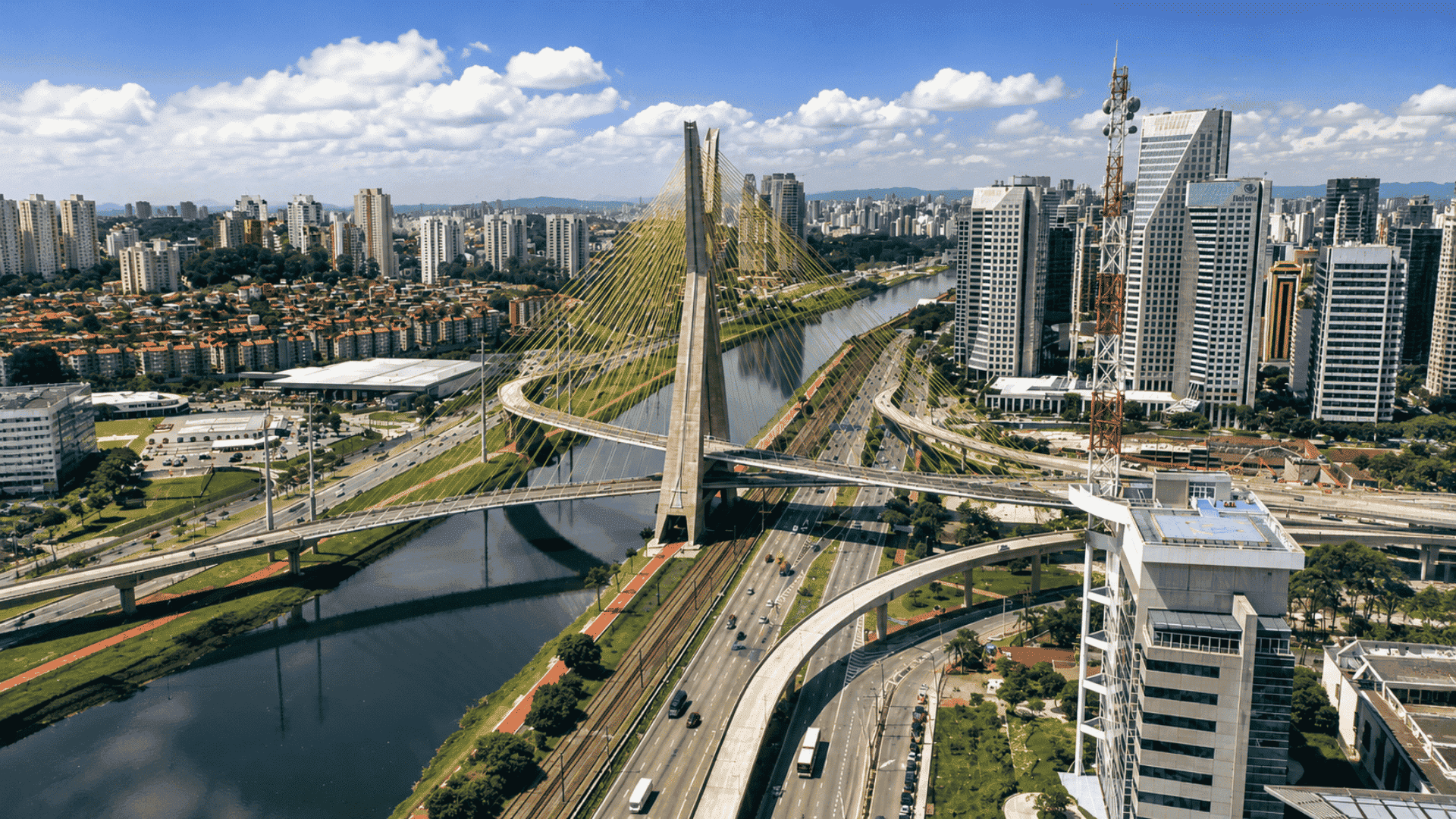 aerial view of sao paulo skyline featuring cable stayed bridge river and modern city buildings