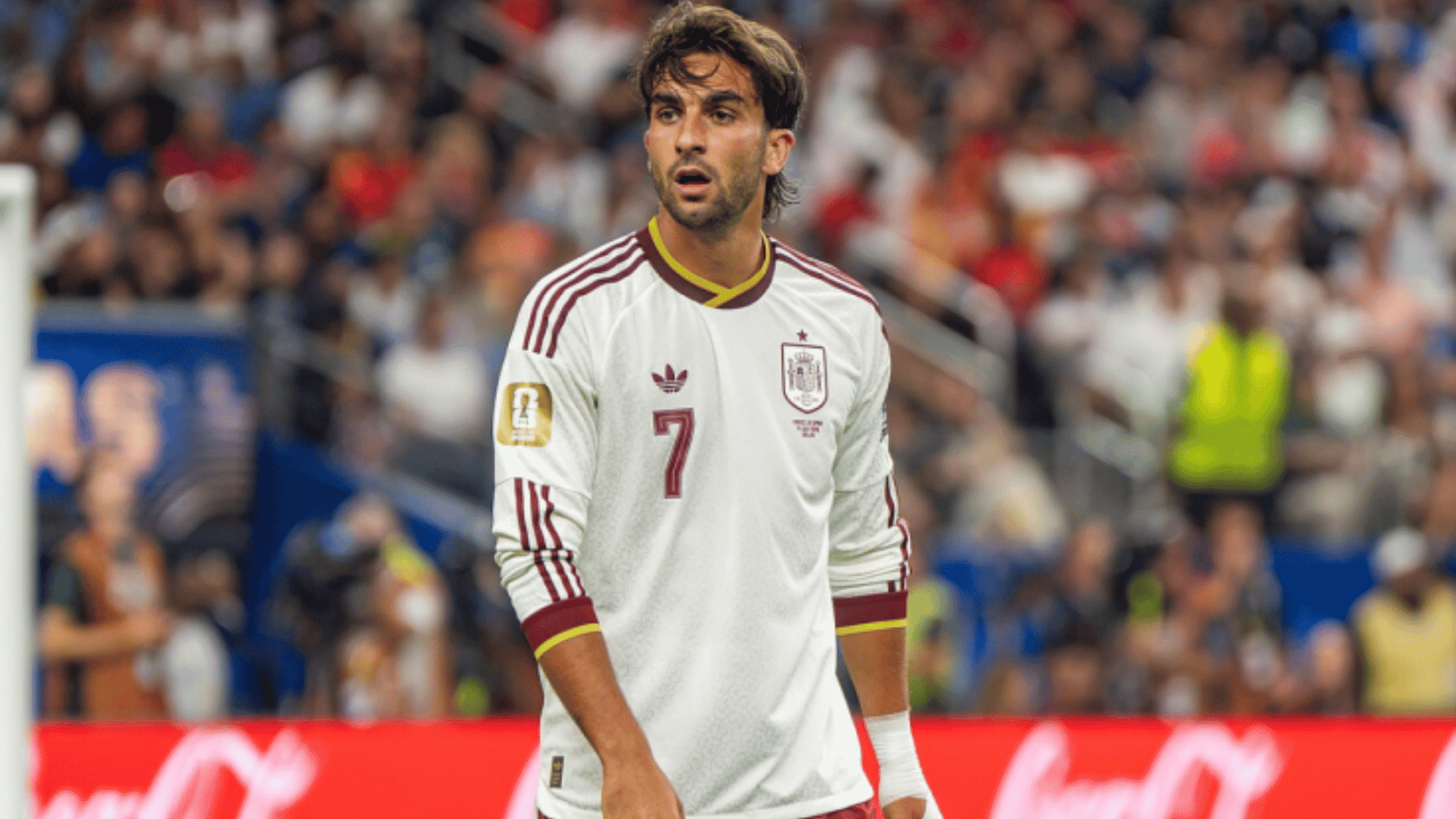 ferran torres standing on the football field in the spain national team kit during an international match