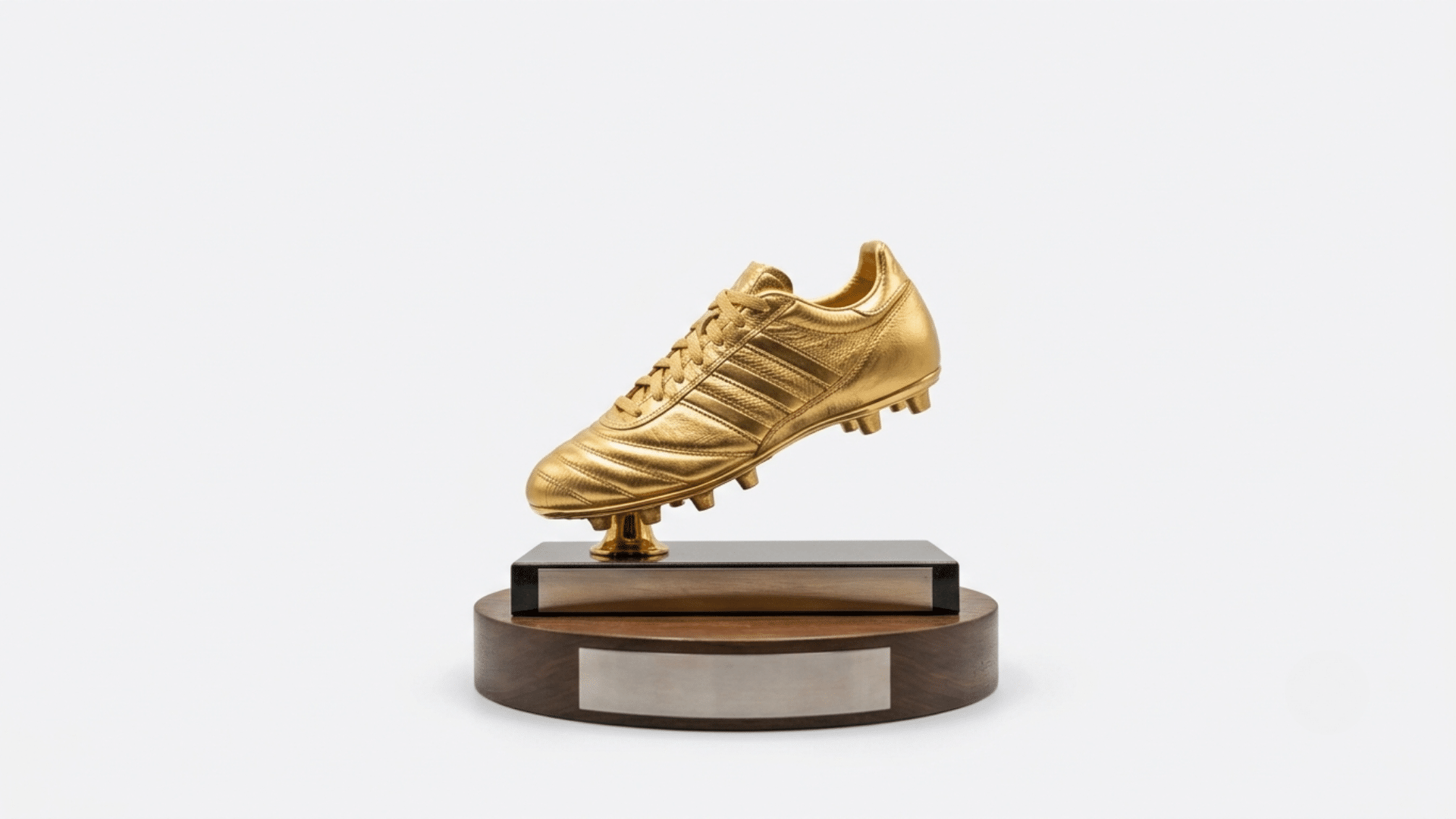 golden boot trophy for the world cup displayed near a football as fans celebrate the top scorer achievement