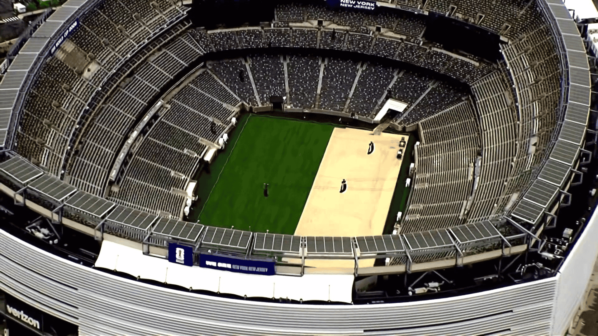 high angle view of the stadium field showing a split surface configuration from above