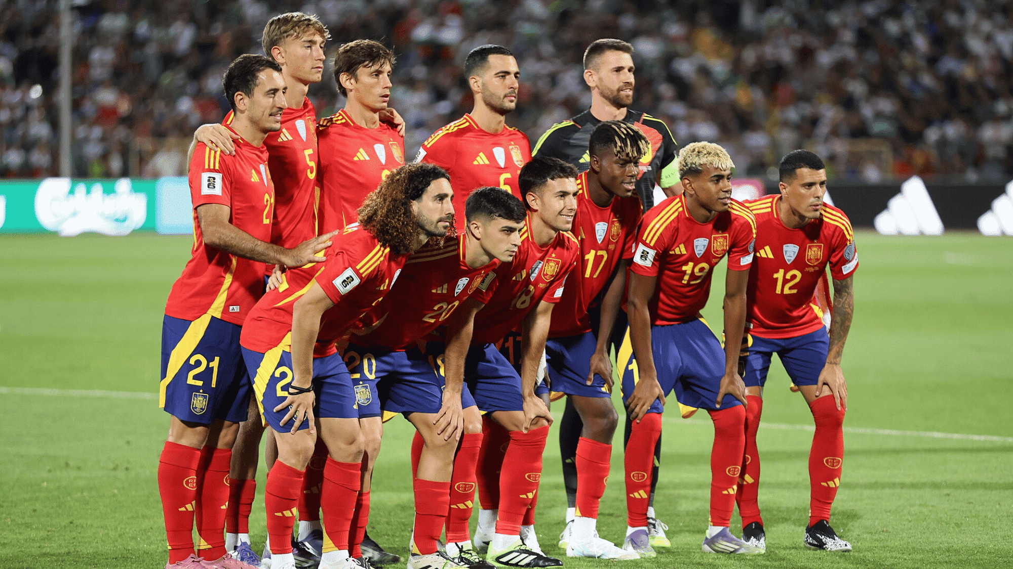spain players posing together before the 2026 fifa world cup final showing the championship winning starting lineup