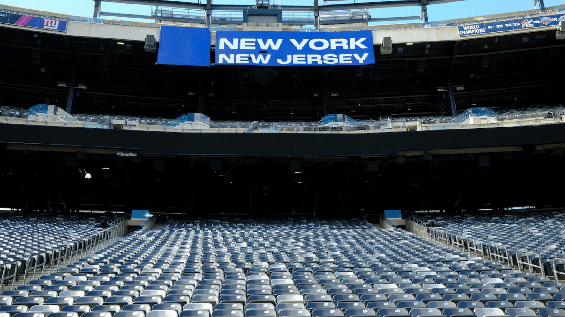 stadium seating view highlighting a blue new york new jersey banner above the stands