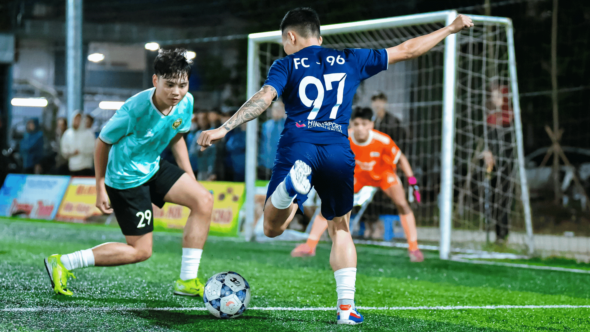 close up of soccer player feet controlling the ball during a competitive match on a green field