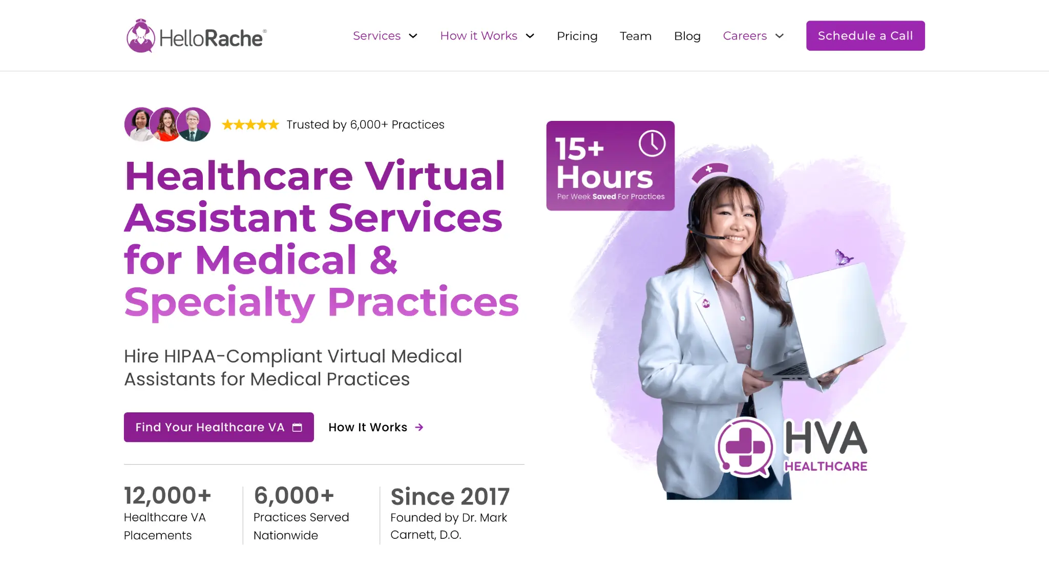 Smiling woman in white coat with headset holding laptop against purple background