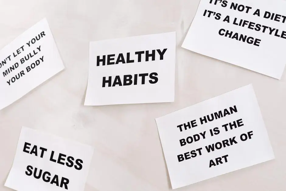 White paper cards with motivational health messages on light background surface