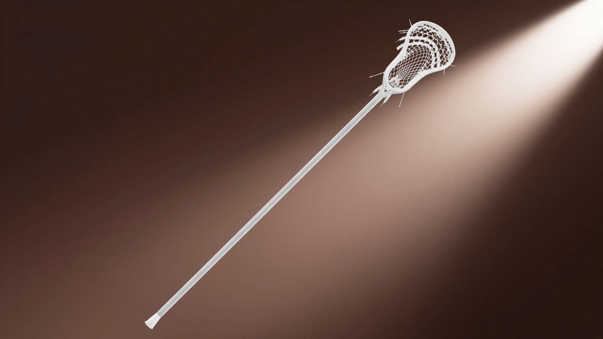 stringking complete 3 pro defense lacrosse stick with long shaft and white head under studio lighting