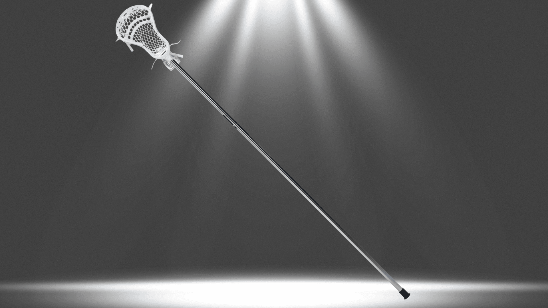 stx hammer 900 complete defense lacrosse stick with long shaft and white head on a gray background